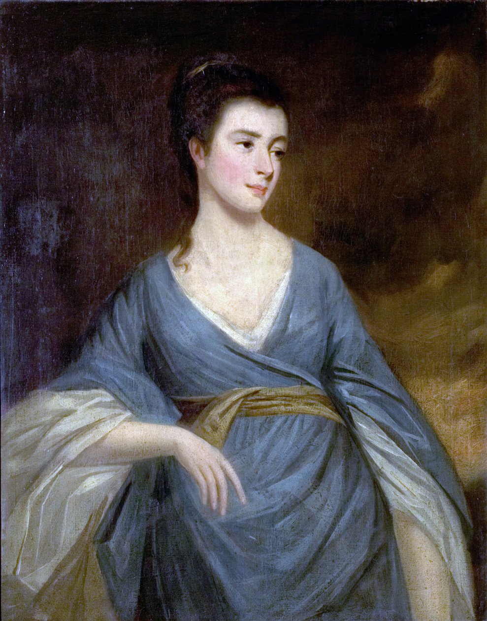Junge Frau in einem blauen Kleid von English School