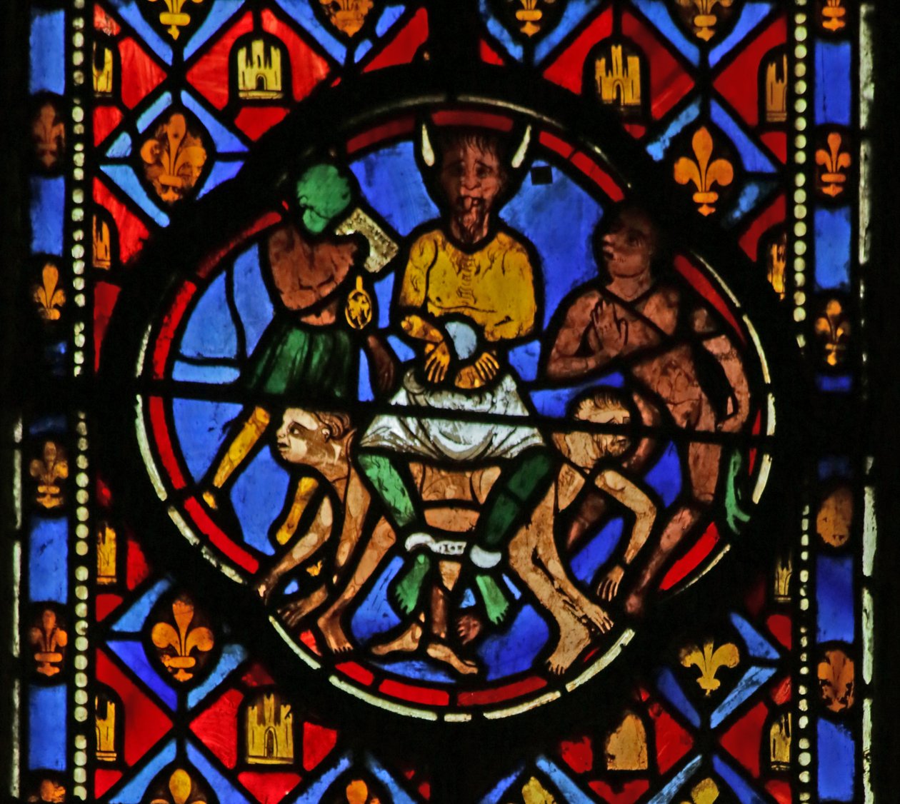 Fenster mit Darstellung von Satan in seinem Hof von French School