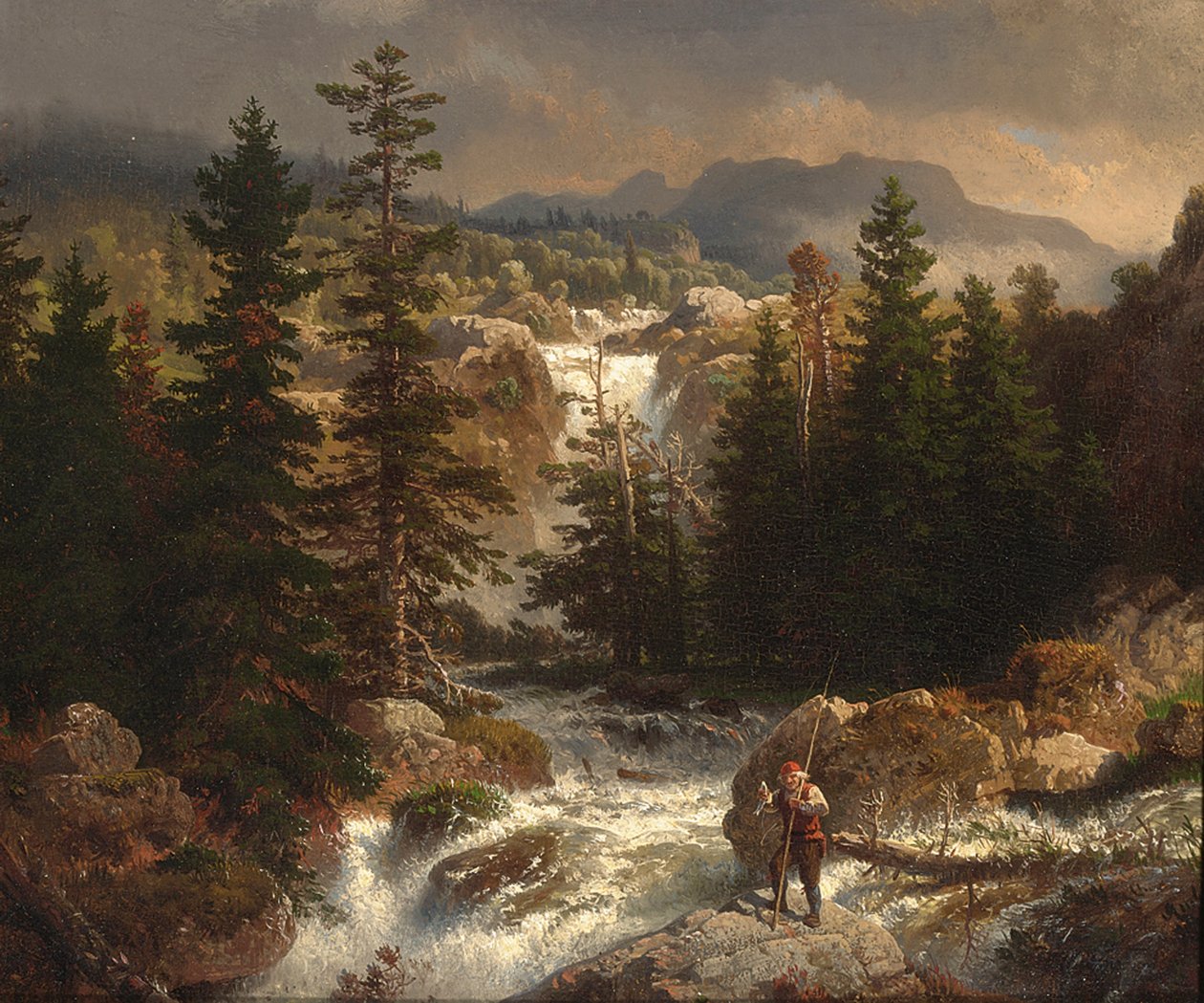 Ein Fischer inspiziert seinen Fang an einem Wildbach von Andreas Achenbach