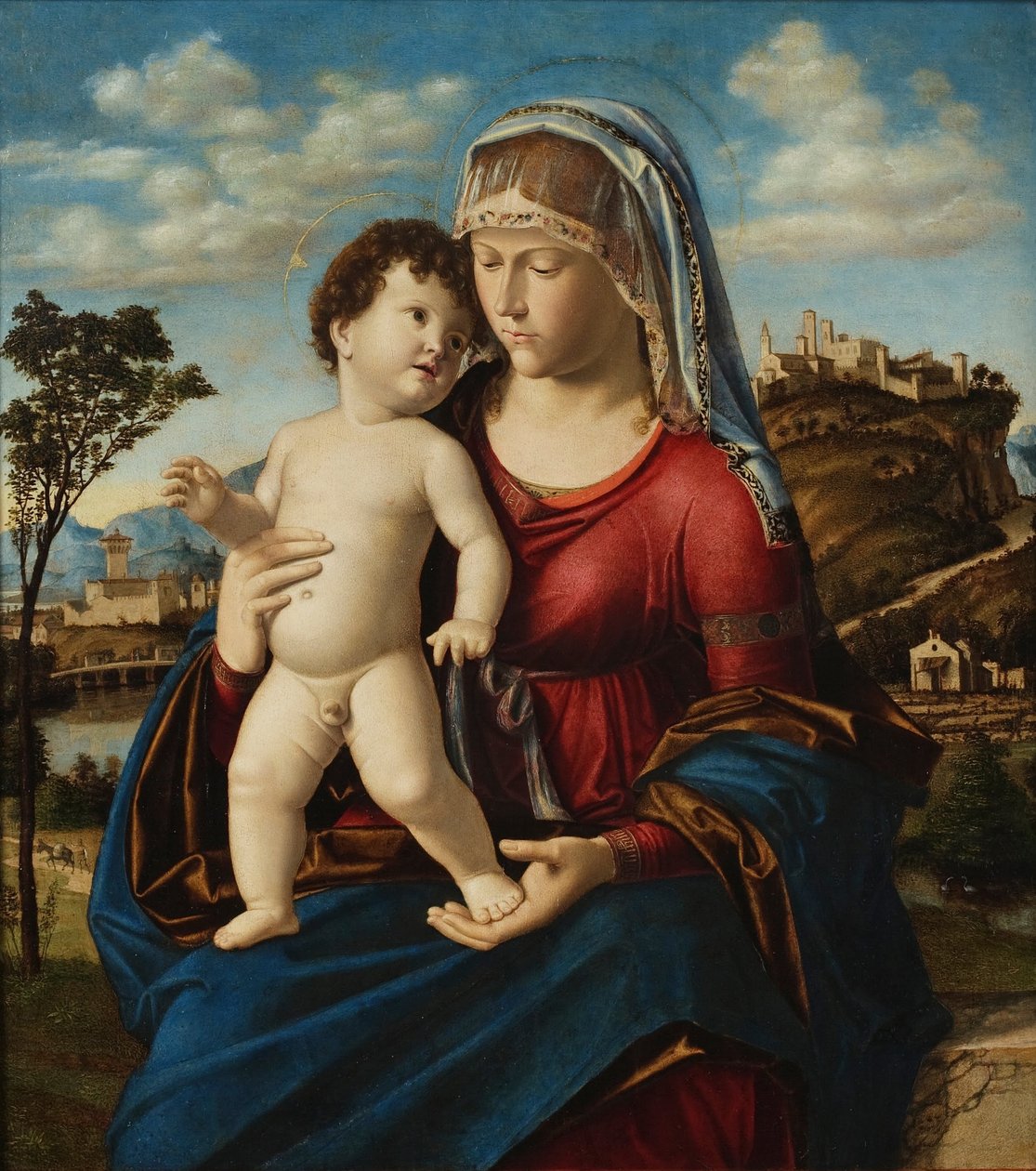 Madonna und Kind in einer Landschaft von Cima da Conegliano