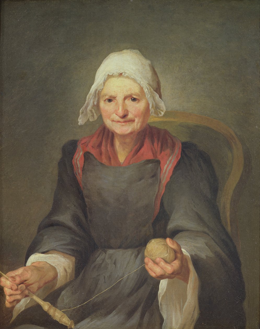 Eine alte Frau beim Spinnen von French School