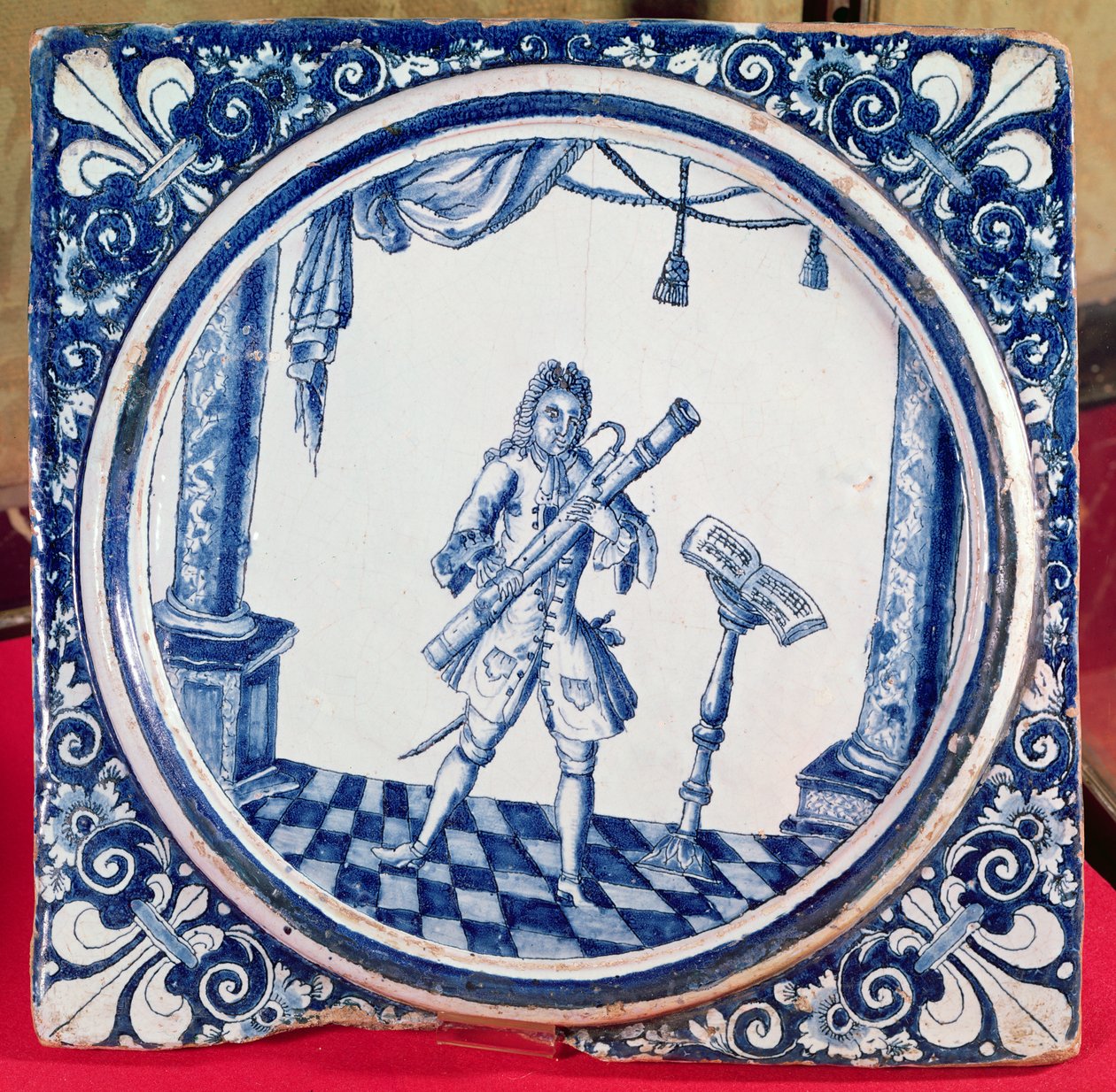 Fliese mit Darstellung eines Fagottisten, 1706 (Faience) von French School