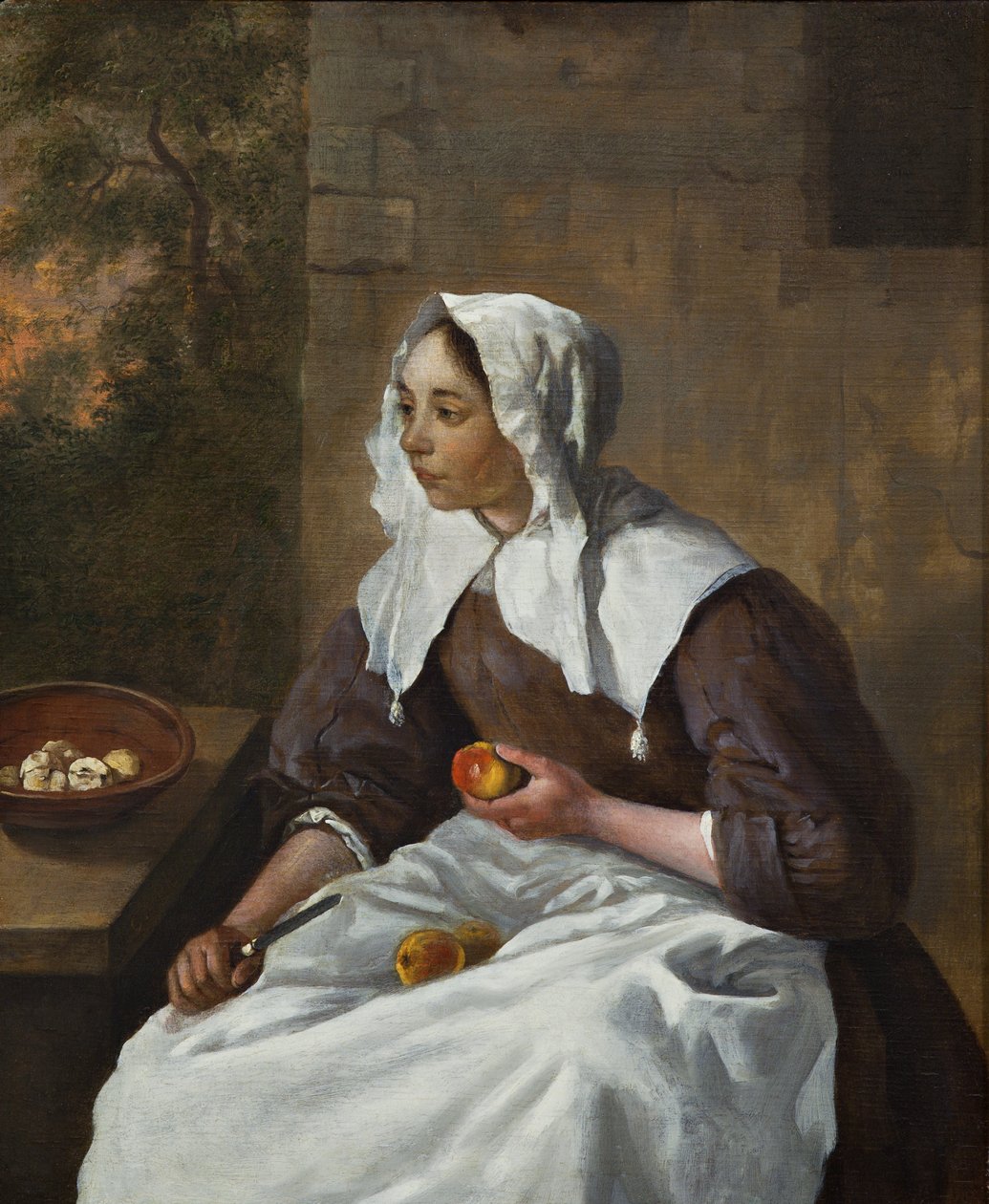 Mädchen schält Äpfel von Gabriel Metsu