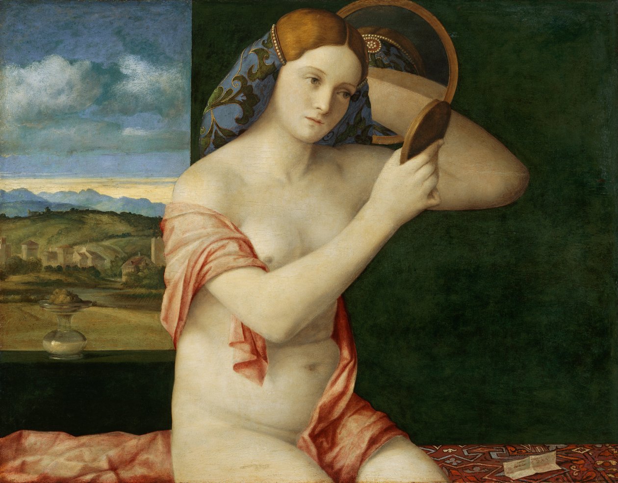 Junge Frau bei ihrer Toilette von Giovanni Bellini