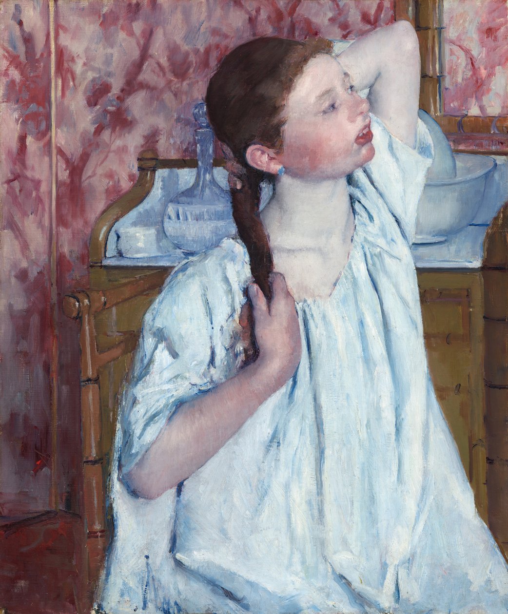 Mädchen, das ihr Haar ordnet von Mary Cassatt