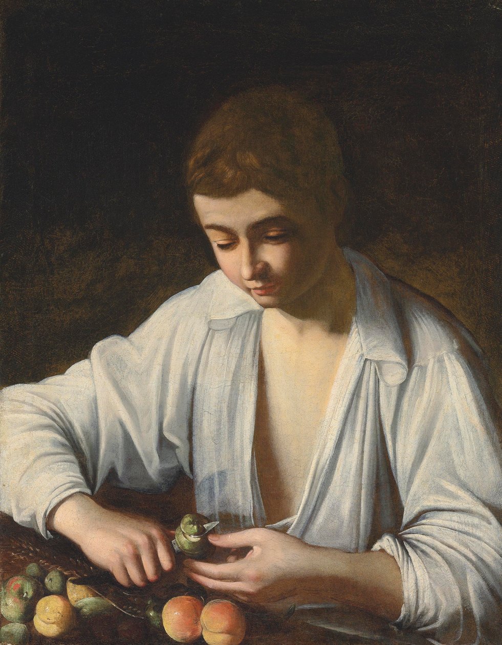 Ein Junge schält Obst von Michelangelo Merisi Caravaggio
