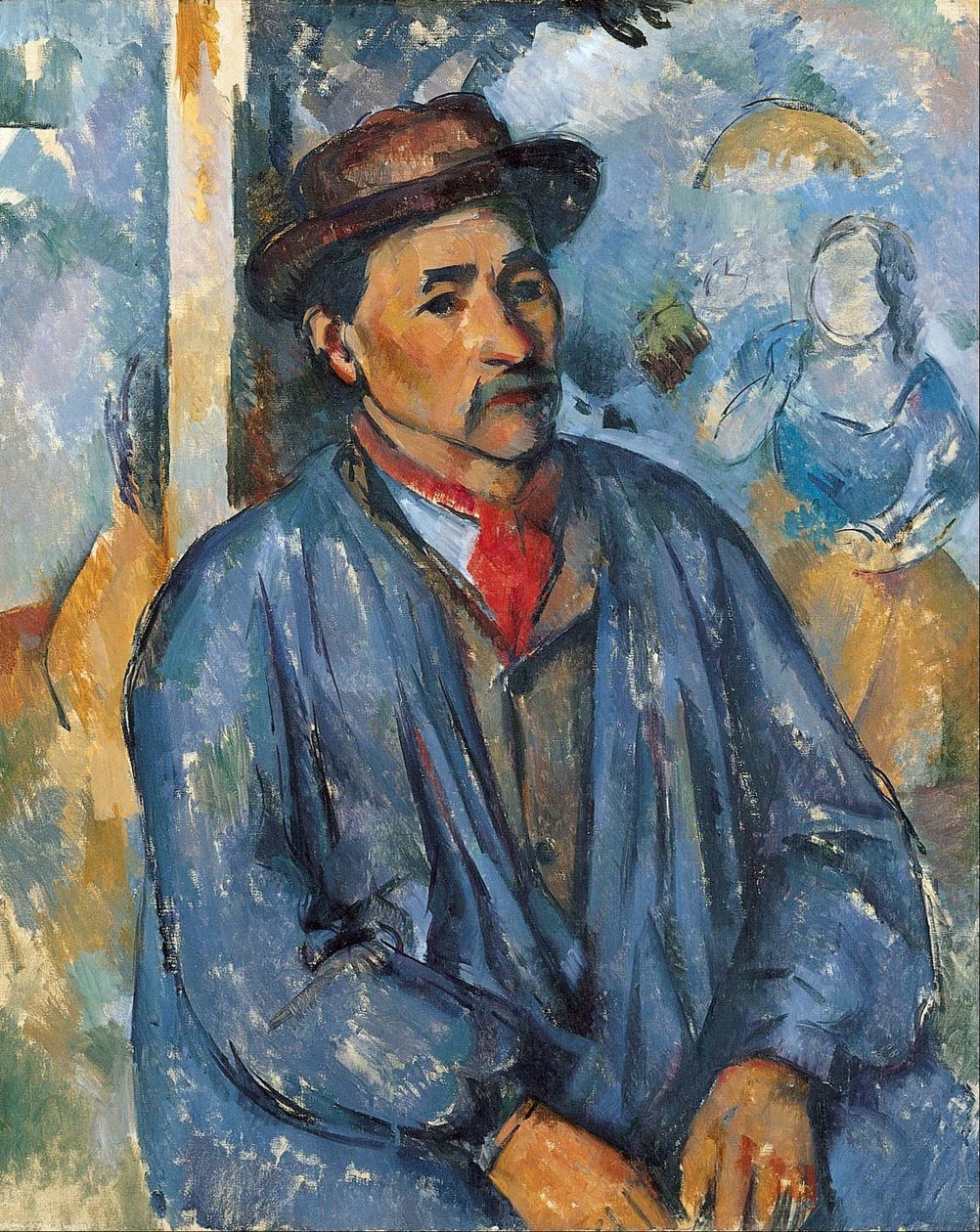 Mann in einer blauen Bluse von Paul Cézanne