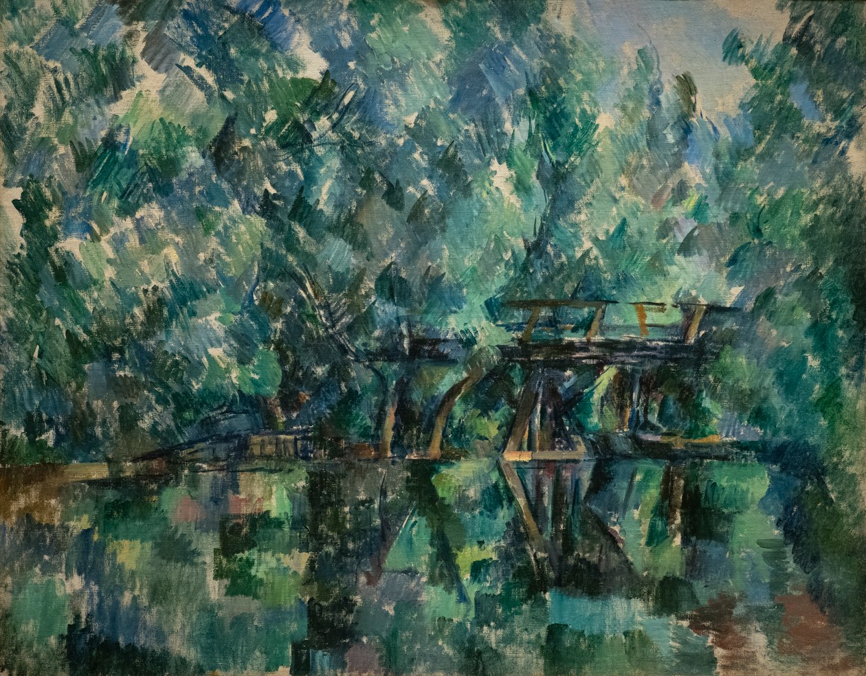 Eine Brücke über einen Teich in Saint-Maur-des-Fossés von Paul Cézanne