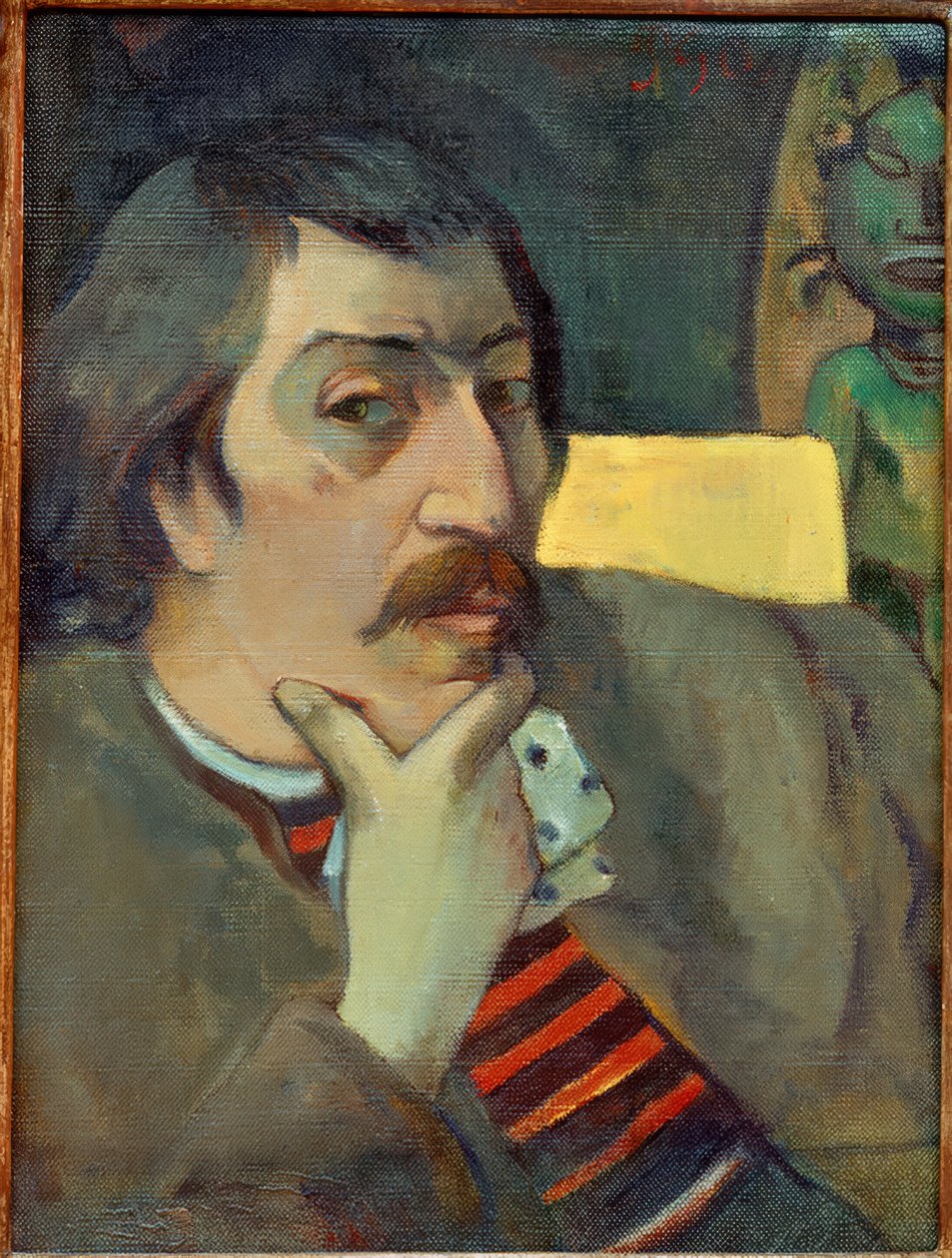 Selbstporträt mit Idol von Paul Gauguin
