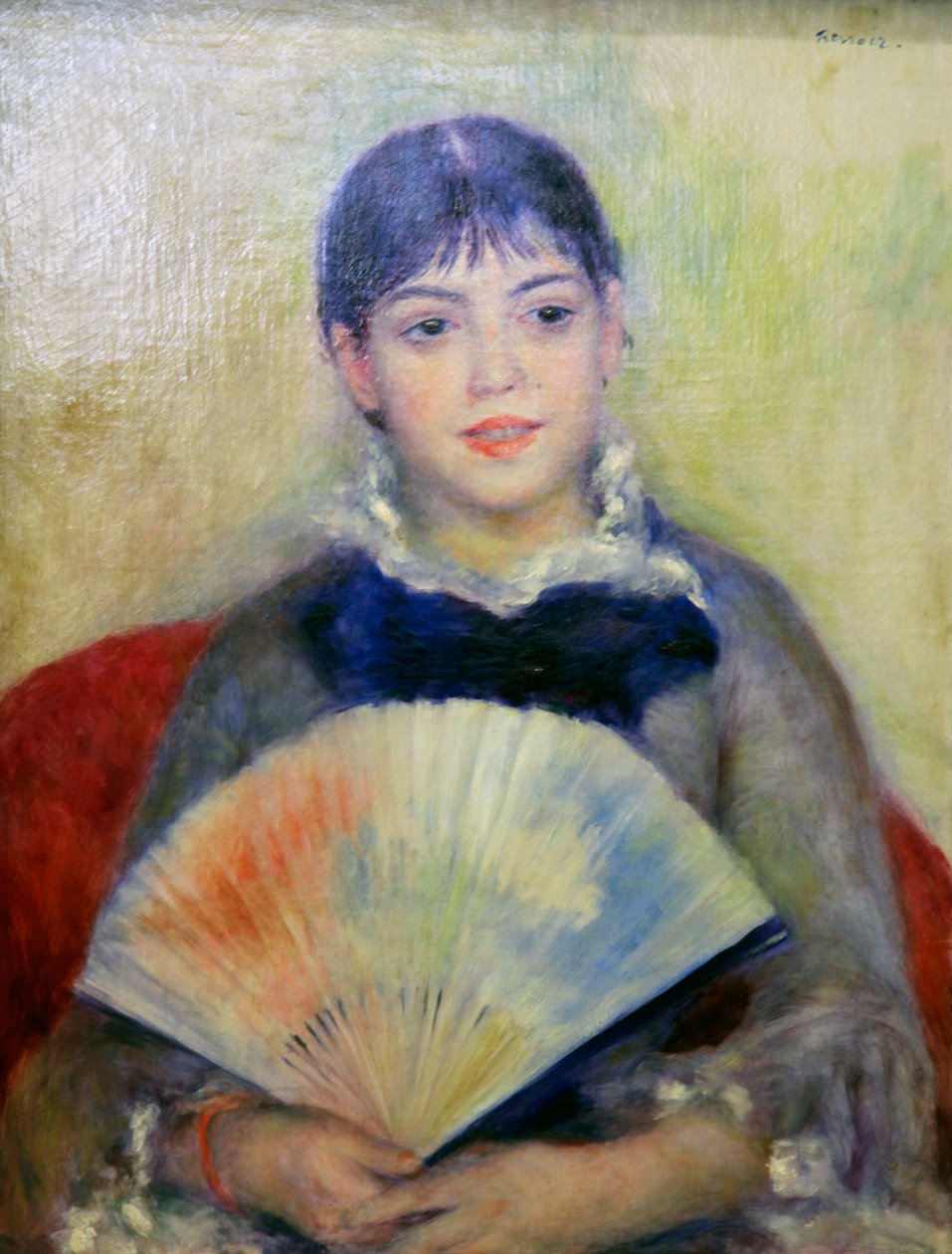 Junge Frau mit einem Fächer von Pierre Auguste Renoir