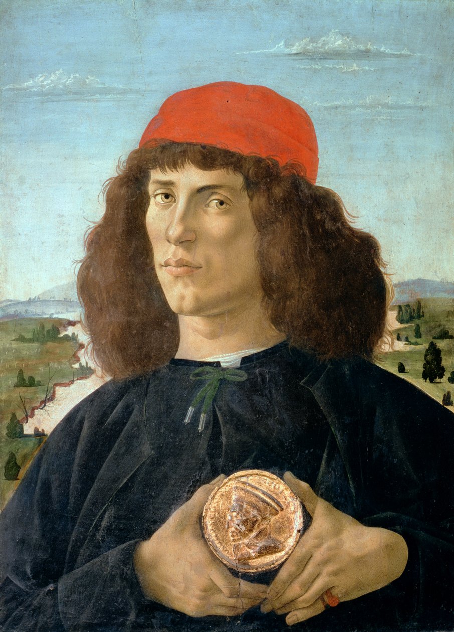 Porträt eines jungen Mannes, der eine Medaille von Cosimo I. de