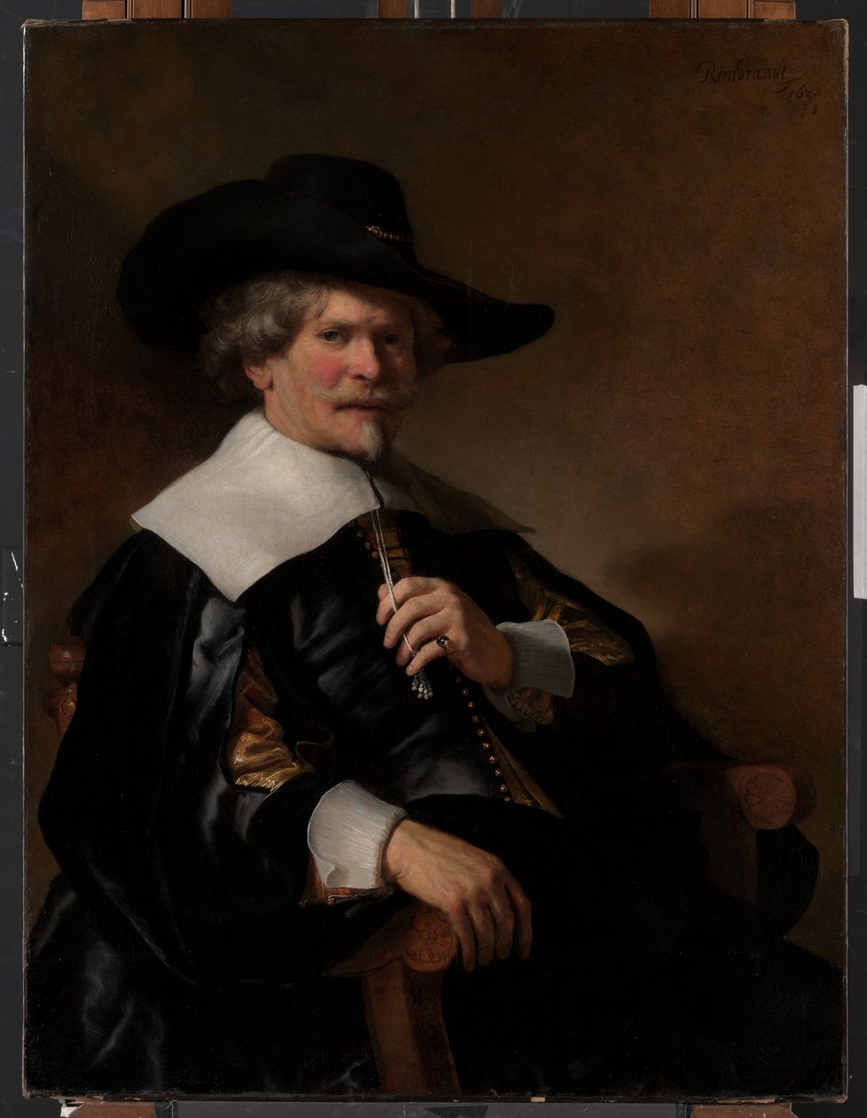 Porträt eines Mannes, der in einem Sessel sitzt von Unknown