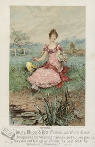 Dame sitzt auf Wiese