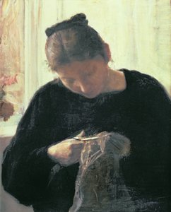 Eine Frau beim Nähen