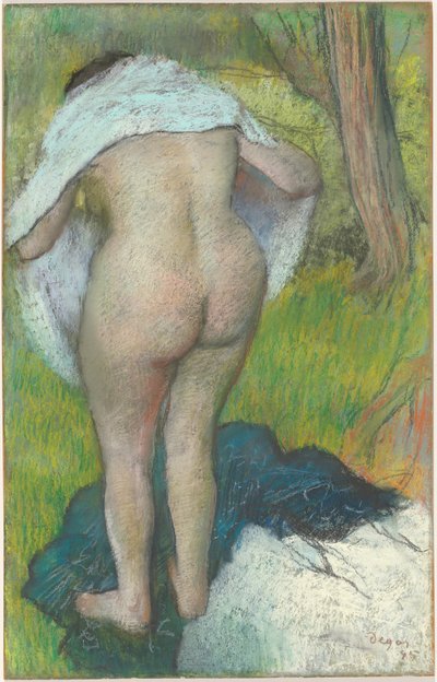 Junge Frau, die sich anzieht von Edgar Degas