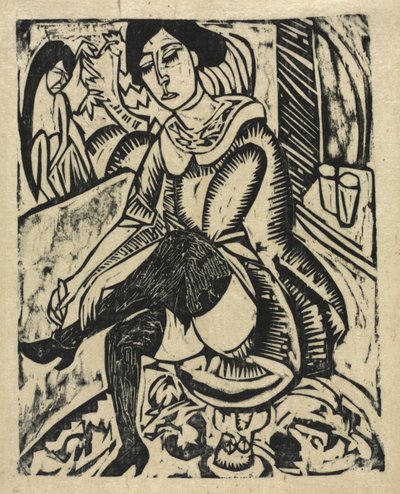 Frau zieht ihre Schuhe an von Ernst Ludwig Kirchner