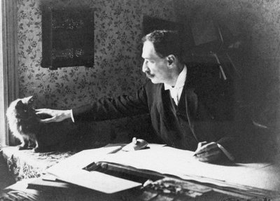 Louis Wain an seinem Zeichentisch, 1890er Jahre von Unbekannt