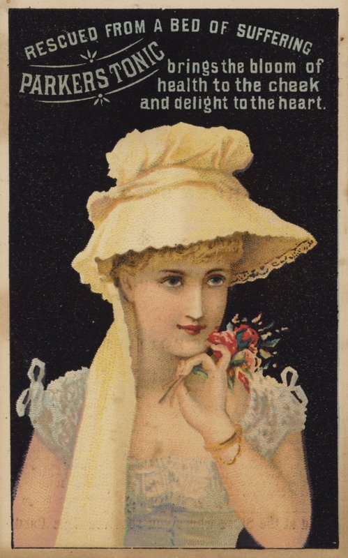 Hübsche Dame riecht an Blumen von American School